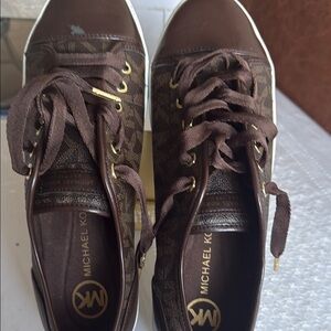 Michael Kors Brown Sneakers has a small scratch